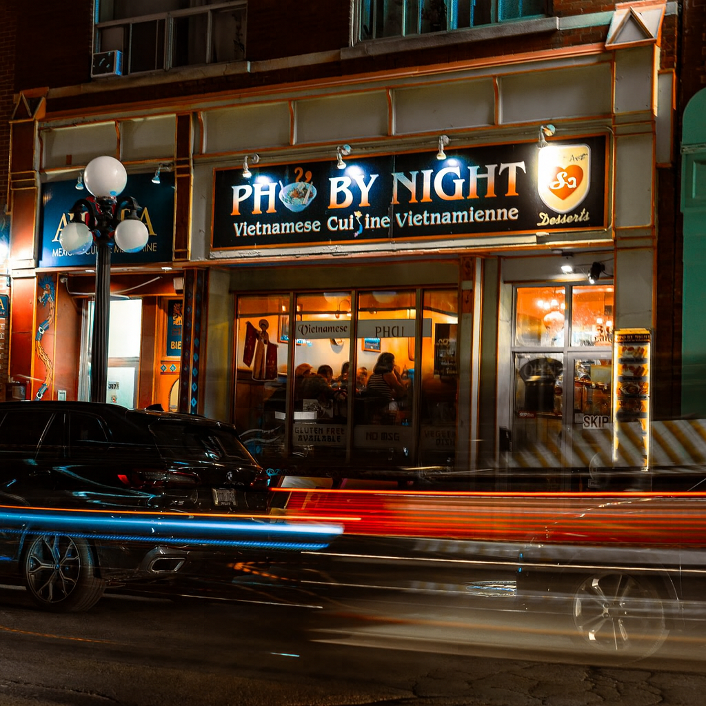 Pho By Night Vietnamese restaurant storefront at night in Ottawa Byward Market
