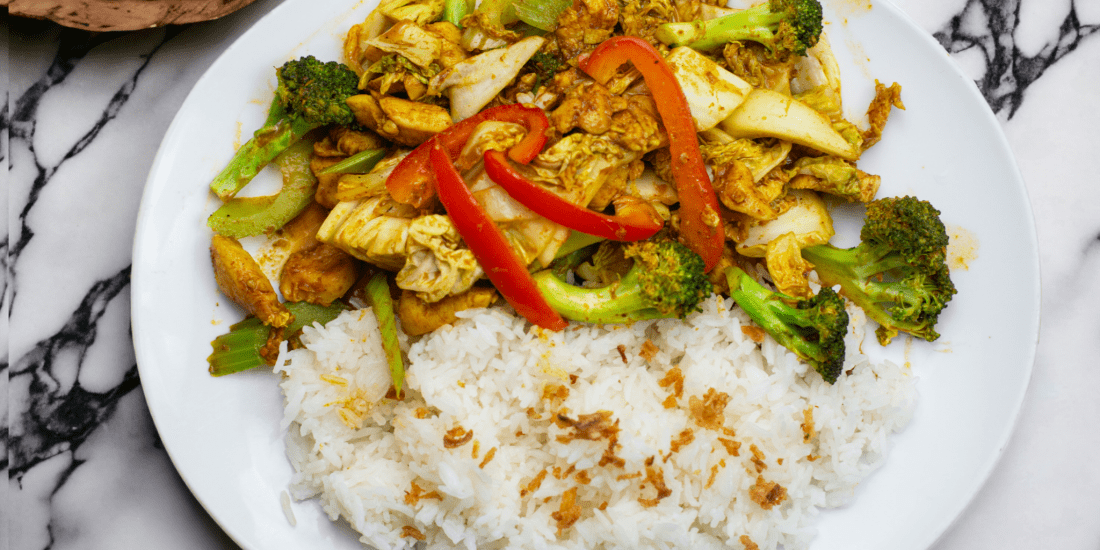 Stirred Fried Yellow Chicken Curry on Steamed Jasmine Rice