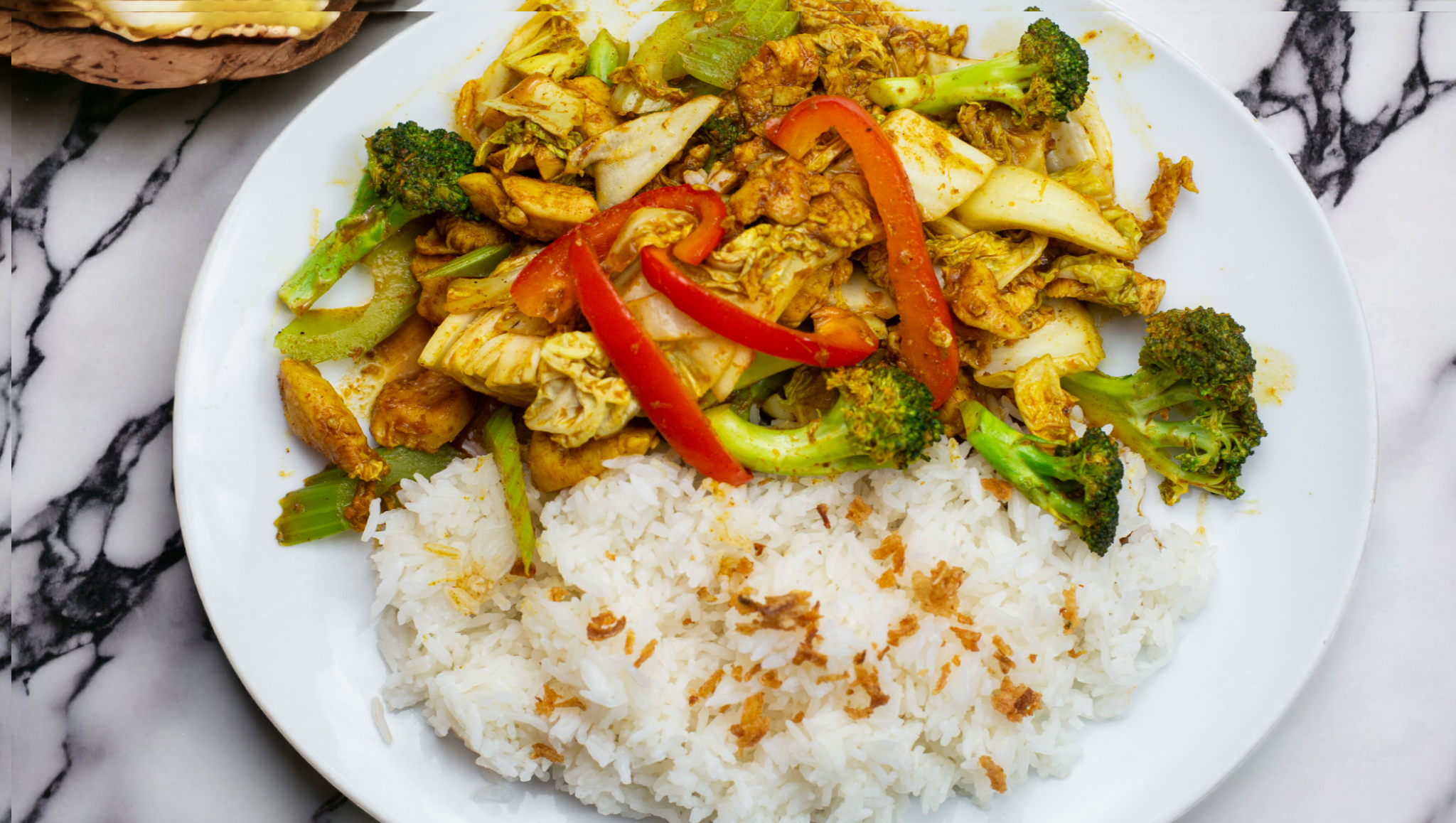 Stirred Fried Yellow Chicken Curry on Steamed Jasmine Rice