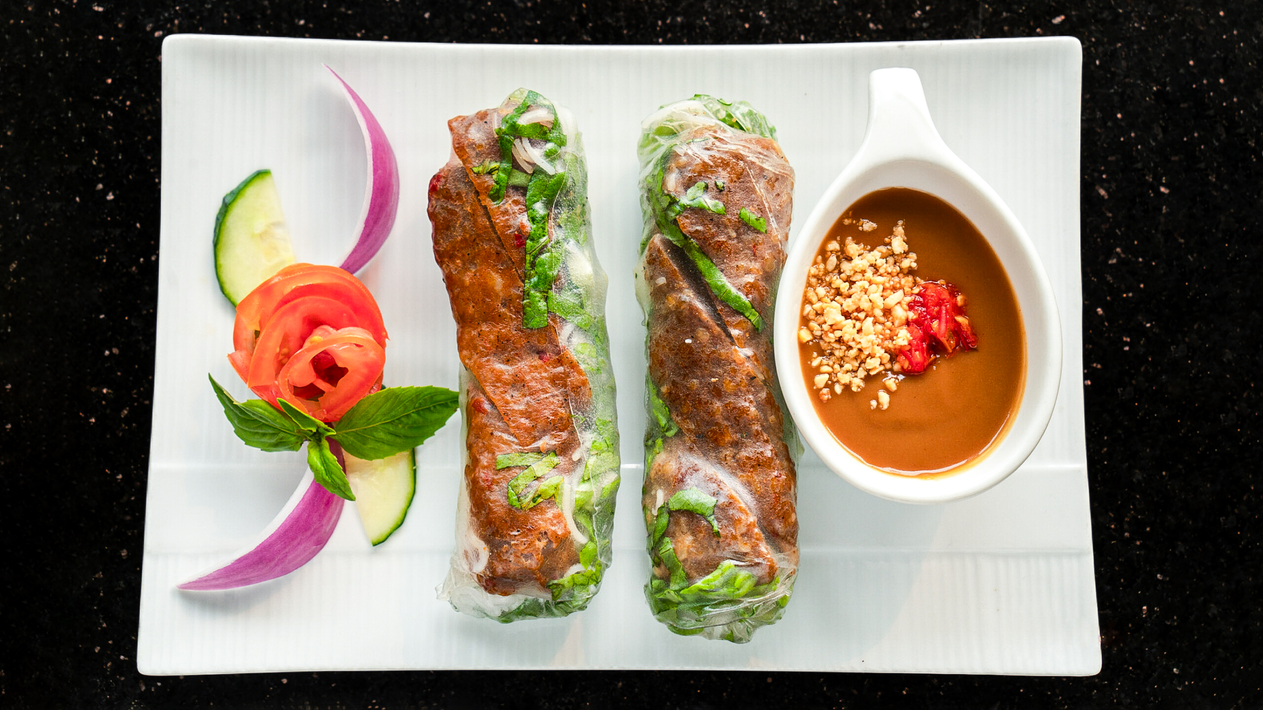 Spicy Grilled Pork Winter Rolls with Peanut Sauce